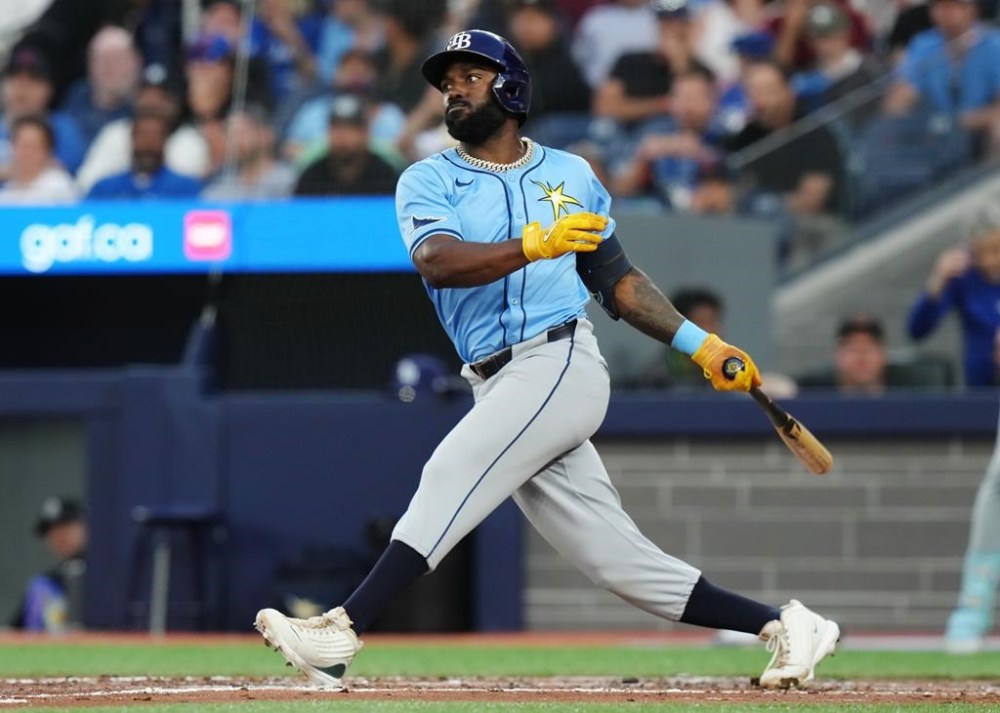 Tampa Bay Rays' Randy Arozarena (56) hits an RBI single against the Toronto Blue Jays during sixth inning American League MLB baseball action in Toronto on Wednesday, July 24, 2024. THE CANADIAN PRESS/Chris Young