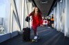 14-year old Canadian Olympic athlete in skateboarding, Fay DeFazio Ebert, skates down to board the plane headed to the 2024 Paris Olympics, in Toronto on Wednesday, July 24, 2024. THE CANADIAN PRESS/Christopher Katsarov