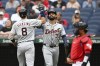 Detroit Tigers' Matt Vierling (8) and Riley Greene (31) celebrate a solo home run hit by Vierling during the first inning of a baseball game against the Cleveland Guardians, Wednesday, July 24, 2024, in Cleveland. (AP Photo/Nick Cammett)