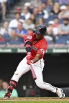 Cleveland Guardians' Angel Martínez hits a single during the fourth inning of a baseball game against the Detroit Tigers, Wednesday, July 24, 2024, in Cleveland. (AP Photo/Nick Cammett)