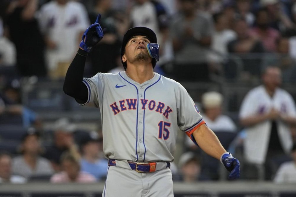 New York Mets' Tyrone Taylor celebrates after hitting a home run during the third inning of a baseball game against the New York Yankees, Wednesday, July 24, 2024, in New York. (AP Photo/Pamela Smith)