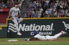 Texas Rangers' Adolis García (53) safely steals second base against Chicago White Sox shortstop Brooks Baldwin during the third inning of a baseball game in Arlington, Texas, Wednesday, July 24, 2024. (AP Photo/LM Otero)