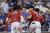 Arizona Diamondbacks' Ketel Marte (4) celebrates hitting a three-run home run with Corbin Carroll (7) during the ninth inning of a baseball game against the Kansas City Royals in Kansas City, Mo., Wednesday, July 24, 2024. (AP Photo/Colin E. Braley)