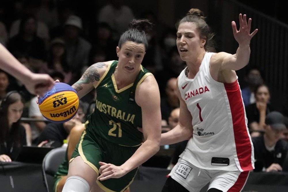 Marena Whittle of Australia, left, controls the ball against Michelle Plouffe of Canada right, during a women's 3x3 basketball final of FIBA Universality Olympic Qualifying Tournament, Sunday, May 5, 2024, in Utsunomiya, north of Tokyo, Japan. Getting to the Paris Olympics has been a humbling experience for Katherine and Michelle Plouffe.
The twin sisters not only put sweat into the journey, but their own money and countless hours as they built Canada's three-on-three basketball program from the ground up. THE CANADIAN PRESS/AP/Shuji Kajiyama