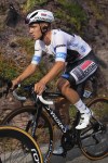 Belgium's Remco Evenepoel, wearing the best young rider's white jersey, rides during the twentieth stage of the Tour de France cycling race over 132.8 kilometers (82.5 miles) with start in Nice and finish in La Couillole pass, France, Saturday, July 20, 2024. (AP Photo/Daniel Cole)