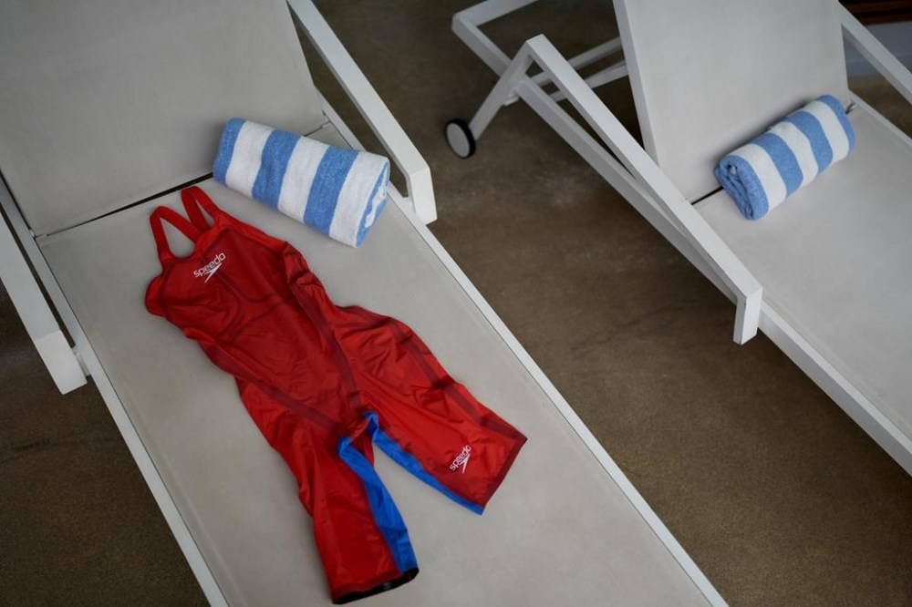 A Speedo Fastskin LZR Pure Valor 2.0. sits on a chair before Jenna Fryer of The Associated Press tests the swimsuit that will be used by many swimmers at the 2024 Summer Olympics, at the Molitor Hotel, Thursday, July 25, 2024, in Paris, France. Speedo allowed journalists to try what it claims is the
