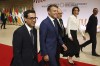 French President Emmanuel Macron, center, arrives at the Sport for Sustainable Development Summit at the Paris Olympic games, Thursday, July 25 2024 at the Carrousel du Louvre in Paris, France. (Andre Pain, Pool via AP)