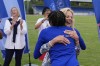 First lady Jill Biden, right, hugs U.S. track and field athlete Melissa Jefferson at the team's training facility during the 2024 Summer Olympics, Thursday, July 25, 2024, in Eaubonne, France. (AP Photo/George Walker IV)