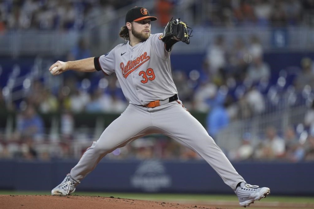 Baltimore Orioles' Corbin Burnes delivers a pitch during the first inning of a baseball game against the Miami Marlins, Thursday, July 25, 2024, in Miami. (AP Photo/Wilfredo Lee)