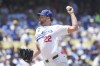Los Angeles Dodgers starting pitcher Clayton Kershaw (22) throws a pitch during the third inning of a baseball game against the San Francisco Giants in Los Angeles, Calif., Thursday, July 25, 2024. (AP Photo/Eric Thayer)