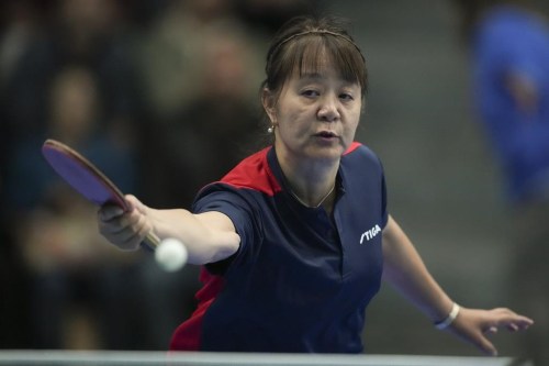 FILE - Chile's Zeng Zhigying returns the ball during a table tennis women's singles round of sixteen match against Lily Ann Zhang of the United States at the Pan American Games in Santiago, Chile, Oct. 31, 2023. (AP Photo/Dolores Ochoa, File)
