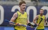 FILE - Australia's Matthew Dawson runs the pitch during a men's field hockey match against Spain at the 2020 Summer Olympics, Friday, July 30, 2021, in Tokyo, Japan. Dawson was so determined to compete in the Paris Olympics that he had part of the ring finger on his right hand amputated. Dawson severely injured the finger in practice two weeks ago. Surgery would have required months of recovery time and jeopardized his likelihood of playing in the tournament. (AP Photo/John Minchillo, File)