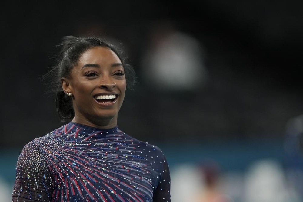 Simone Biles, of the United States, attends a gymnastics training session at Bercy Arena at the Summer Olympics, Thursday, July 25, 2024, in Paris, France. (AP Photo/Francisco Seco)