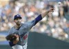 Los Angeles Dodgers' James Paxton pitches against the Detroit Tigers during the second inning of a baseball game Friday, July 12, 2024, in Detroit. (AP Photo/Duane Burleson)