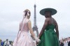 Entertainers Ariana Grande, left, and Cynthia Erivo arrive in Paris, France, before the opening ceremony of the 2024 Summer Olympics, Friday, July 26, 2024. (AP Photo/Natacha Pisarenko)