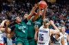 Germany's Alina Hartmann, right, tries to get the ball against, from right, Blessing Ejiofor, Lauren Ebo and Elizabeth Balogun from Nigeria during the Women International Basketball match between Germany and Nigeria at the Uber Arena in Berlin, Friday July 19, 2024. (Andreas Gora/dpa via AP)