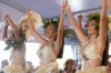 Dancers perform during an opening ceremony for the 2024 Summer Olympics surfing competition Friday, July 26, 2024, in Papara, Tahiti. (AP Photo/Gregory Bull)