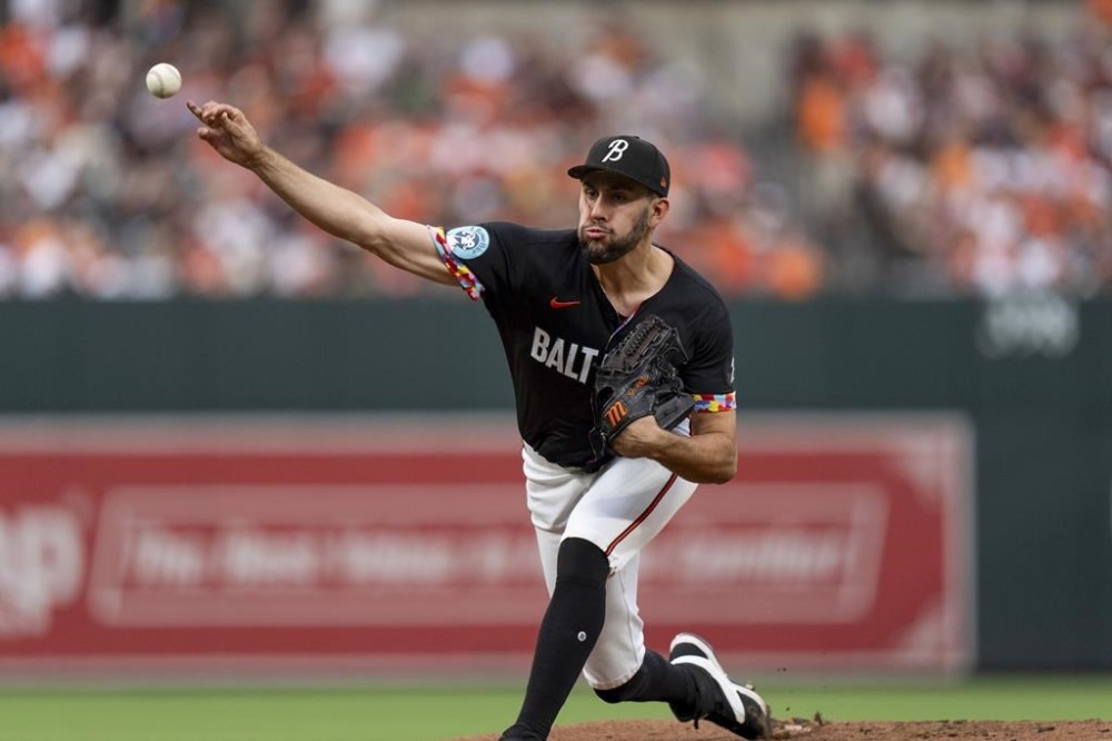 Baltimore Orioles starting pitcher Grayson Rodriguez delivers during the first inning of a baseball game against the San Diego Padres, Friday, July 26, 2024, in Baltimore. (AP Photo/Stephanie Scarbrough)