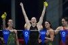 FILE - Cate Campbell, of Australia, and teammates celebrate after winning the gold medal in the women's 4x100-meter medley relay final at the 2020 Summer Olympics, Sunday, Aug. 1, 2021, in Tokyo, Japan. (AP Photo/Gregory Bull, File)
