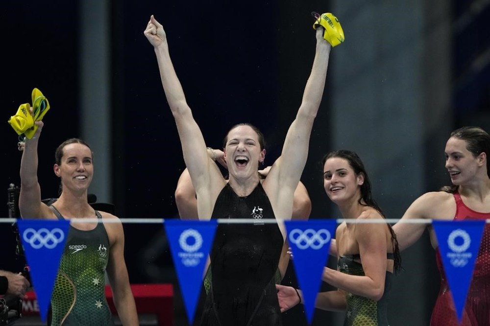 FILE - Cate Campbell, of Australia, and teammates celebrate after winning the gold medal in the women's 4x100-meter medley relay final at the 2020 Summer Olympics, Sunday, Aug. 1, 2021, in Tokyo, Japan. (AP Photo/Gregory Bull, File)