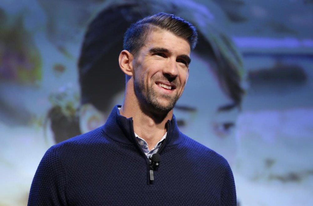 FILE - Michael Phelps speaks during a Panasonic news conference before the CES tech show in Las Vegas, Jan. 6, 2020. (AP Photo/John Locher, File)