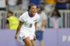 United States' Mallory Swanson reacts after teammate Trinity Rodman scored a goal during a women's group B match between the United States and Zambia at Nice Stadium at the 2024 Summer Olympics, Thursday, July 25, 2024, in Nice, France. (AP Photo/Julio Cortez)
