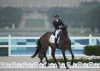 Britain's Rosalind Canter and her horse Lordships Graffalo during the Equestrian Eventing Dressage competition, at the 2024 Summer Olympics, Saturday, July 27, 2024, in Versailles, France. (AP Photo/Mosa'ab Elshamy)