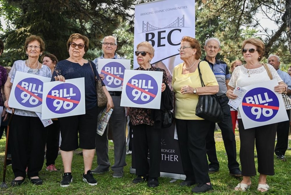 People take part in a protest outside Santa Cabrini Hospital in Montreal, Saturday, July 27, 2024, to denounce new Bill 96 language directives for hospitals and long-term care homes. THE CANADIAN PRESS/Graham Hughes