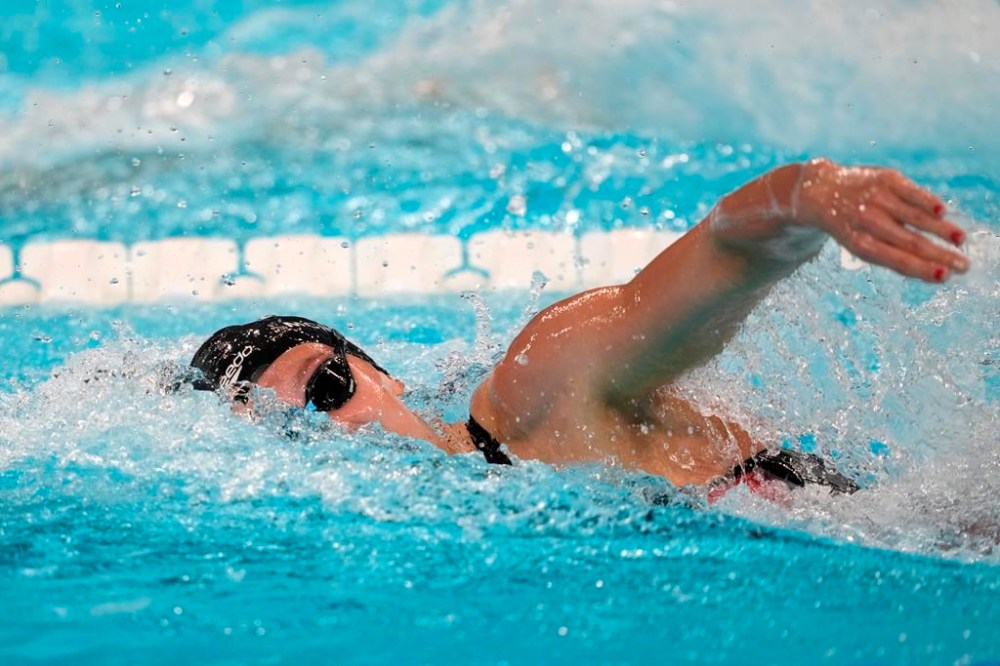 Summer McIntosh, of Canada, competes in the women's 400-meter freestyle final at the 2024 Summer Olympics, Saturday, July 27, 2024, in Nanterre, France. THE CANADIAN PRESS/Adrian Wyld