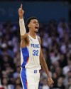 Victor Wembanyama, of France, celebrates after a turnover by Brazil in a men's basketball game at the 2024 Summer Olympics, Saturday, July 27, 2024 in Villeneuve-d'Ascq, France. (AP Photo/Mark J. Terrill)