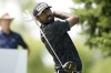 Sahith Theegala watches his tee shot on the second green during the third round of the 3M Open golf tournament at the Tournament Players Club, Saturday, July 27, 2024, in Blaine, Minn. (AP Photo/Charlie Neibergall)