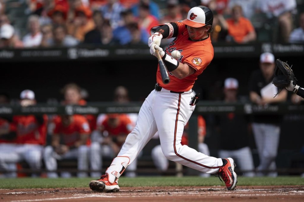 Baltimore Orioles catcher Adley Rutschman (35) swing at the ball during the first inning of a baseball game against the San Diego Padres, Saturday, July 27, 2024, in Baltimore. (AP Photo/Jose Luis Magana)