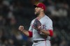 Los Angeles Angels relief pitcher Carlos Estevez celebrates after a baseball game against the Seattle Mariners, Monday, July 22, 2024, in Seattle. (AP Photo/Stephen Brashear)
