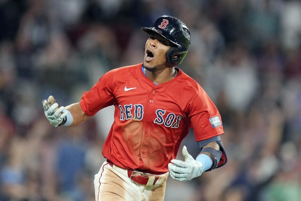 Boston Red Sox's Ceddanne Rafaela reacts after hitting a two-run home run during the seventh inning of a baseball game against the New York Yankees, Friday, July 26, 2024, in Boston. (AP Photo/Michael Dwyer)