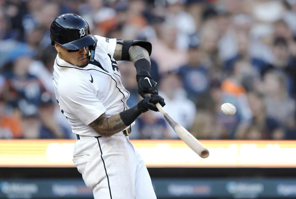 Detroit Tigers' Javier Baez hits a two-run home run against the Minnesota Twins during the seventh inning of a baseball game Saturday, July 27, 2024, in Detroit. (AP Photo/Duane Burleson)