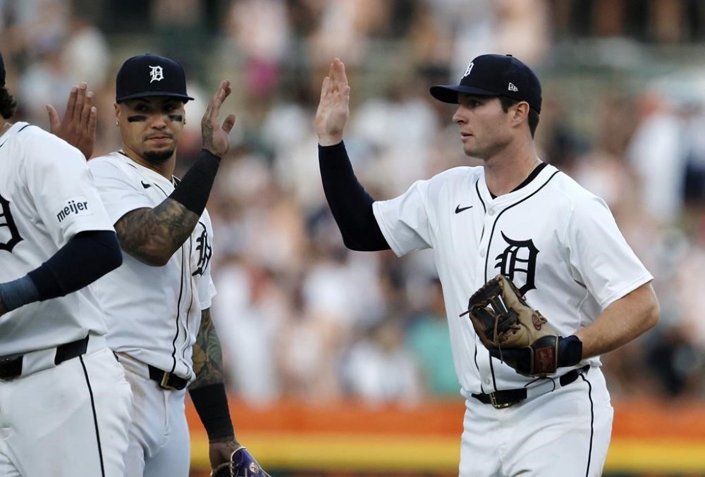 Detroit Tigers' Javier Baez (28) celebrates with Colt Keith after a 7-2 win over the Minnesota Twins in a baseball game, Saturday, July 27, 2024, in Detroit. (AP Photo/Duane Burleson)