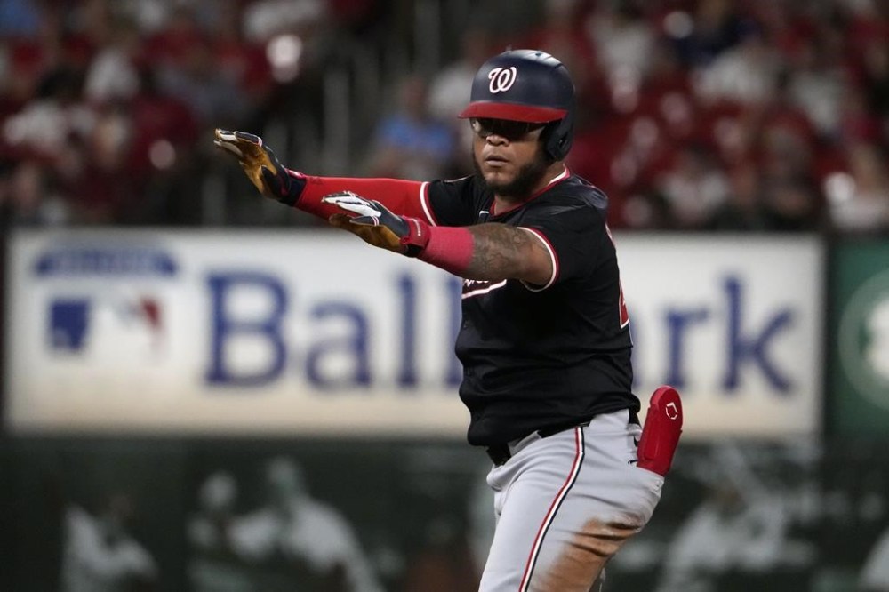Washington Nationals' Harold Ramirez celebrates hitting an RBI double during the sixth inning of a baseball game against the St. Louis Cardinals Saturday, July 27, 2024, in St. Louis. (AP Photo/Jeff Roberson)