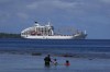 The Aranui 5 cruise ship sits off the coast ahead of the 2024 Summer Olympics surfing competition Friday, July 26, 2024, near Teahupo'o, Tahiti. The cruise ship is being used to house athletes competing in the surfing competition. (AP Photo/Gregory Bull)