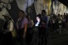 Voters line up at a voting station prior to the opening of the polls for presidential elections in Caracas, Venezuela, Sunday, July 28, 2024. (AP Photo/Cristias Hernandez)