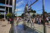 People gather next to the statue of Spanish artist Jordi Diez representing Spain's Rafael Nadal at the Roland Garros stadium during the 2024 Summer Olympics, Sunday, July 28, 2024, in Paris, France. (AP Photo/Manu Fernandez)