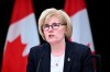 Minister of Sport and Physical Activity Carla Qualtrough speaks at a news conference on the Future of Sport in Canada Commission, at the National Press Theatre in Ottawa, on Thursday, May 9, 2024. Qualtrough says the government is withholding funding relating to suspended Canada Soccer officials.THE CANADIAN PRESS/Justin Tang