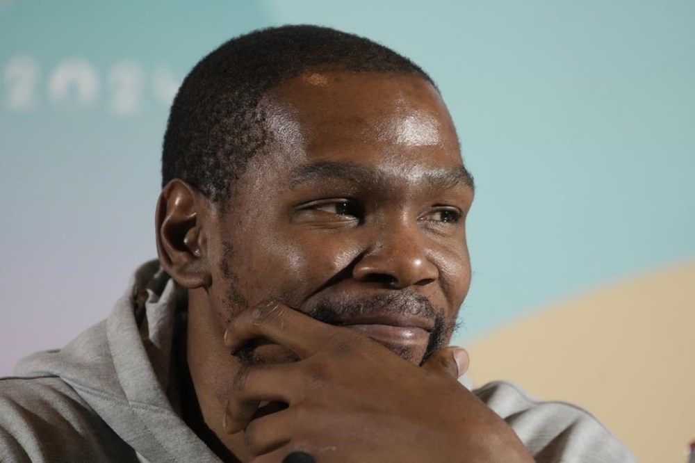United State's men's team Kevin Durant attends a press conference at the 2024 Summer Olympics, Thursday, July 25, 2024, in Paris, France. (AP Photo/Michel Euler)
