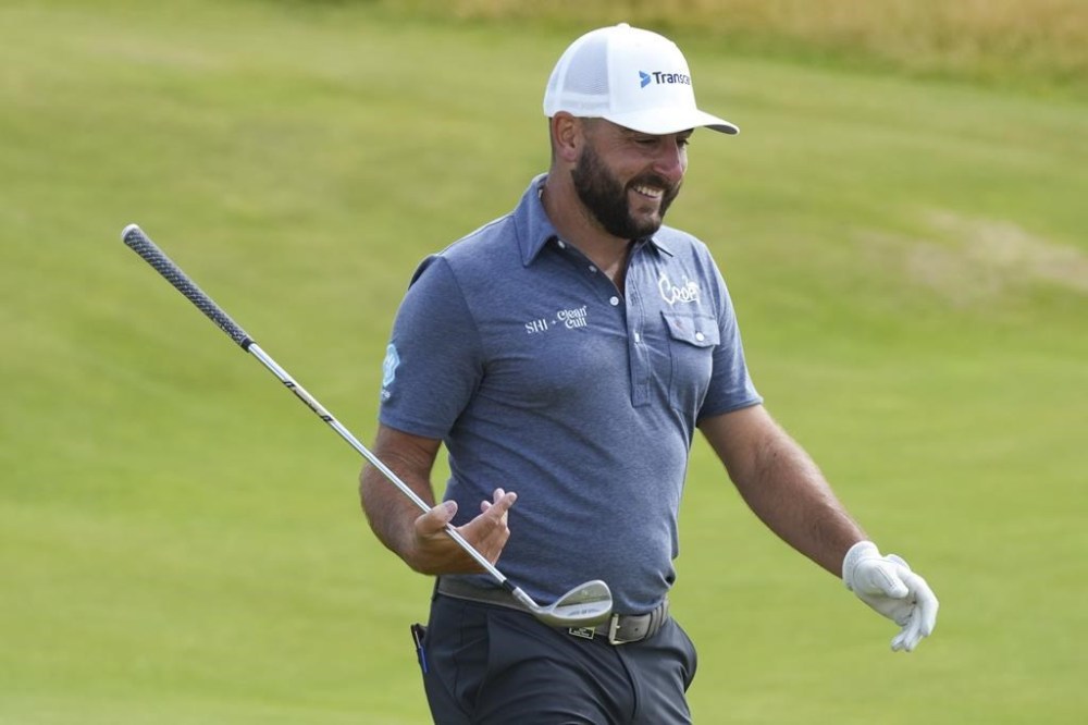 Stephan Jaeger of Germany walks down the 15th fairway during a practice round ahead of the British Open Golf Championships at Royal Troon golf club in Troon, Scotland, Wednesday, July 17, 2024. (AP Photo/Jon Super)
