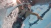 Summer McIntosh, of Canada, competes during a heat in the women's 400-meter freestyle at the 2024 Summer Olympics, Saturday, July 27, 2024, in Nanterre, France. McIntosh picked up her first Olympic medal Saturday with a silver in the women's 400-metre freestyle. On Monday, the 17-year-old swimming star from Toronto looks to pick up more hardware when she swims in her signature event. THE CANADIAN PRESS/AP-David J. Phillip