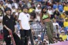 Rayssa Leal, of Brazil, right, gestures during the women's skateboard street final at the 2024 Summer Olympics, Sunday, July 28, 2024, in Paris, France. At left is Liz Akama, of Japan, and center Coco Yoshizawa, also of Japan.(AP Photo/Vadim Ghirda)