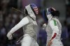 United States' Lee Kiefer, left, competes with Italy's Alice Volpi in the women's individual Foil semifinal match during the 2024 Summer Olympics at the Grand Palais, Sunday, July 28, 2024, in Paris, France. (AP Photo/Andrew Medichini)