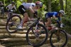 Haley Batten, of United States, left, and Chiara Teocchi, of Italy, competes in the women's mountain bike cycling event, at the 2024 Summer Olympics, Sunday, July 28, 2024, in Elancourt, France. (AP Photo/George Walker IV)
