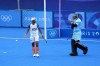 New Zealand's goalkeeper Dominic Dixon, right, reacts as India's Mandeep Singh, left, celebrates after scoring his side's first goal during the men's Group B hockey match between India and New Zealand at the Yves-du-Manoir Stadium during the 2024 Summer Olympics, Saturday, July 27, 2024, in Colombes, France. (AP Photo/Aijaz Rahi)