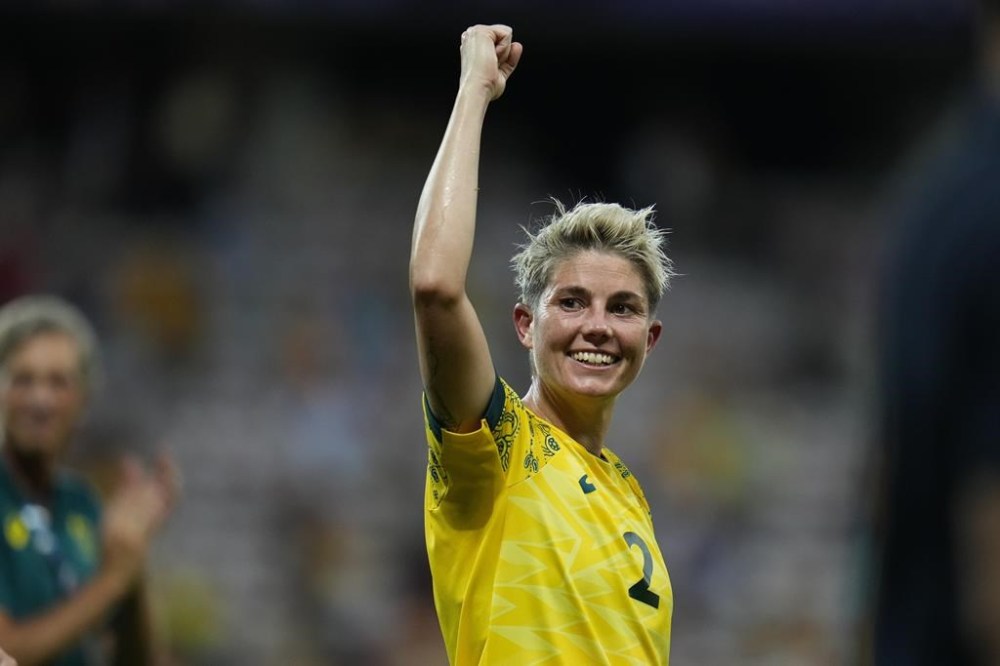 Australia's Michelle Heyman celebrates after beating 6-5 Zambia during a women's group B soccer match at the 2024 Summer Olympics, Sunday, July 28, 2024, in Nice, France. (AP Photo/Julio Cortez)