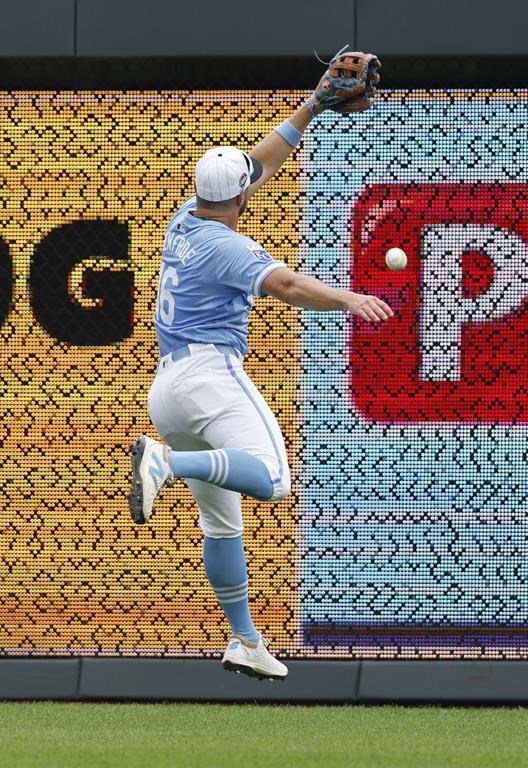 Kansas City Royals right fielder Hunter Renfroe is unable to catch an RBI double by Chicago Cubs' David Bote during the sixth inning of a baseball game in Kansas City, Mo., Sunday, July 28, 2024. (AP Photo/Colin E. Braley)